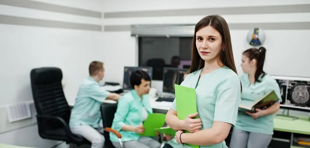 Nursing student smiling at campus